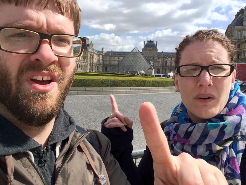 Pointing at The Louvre, Paris, France
