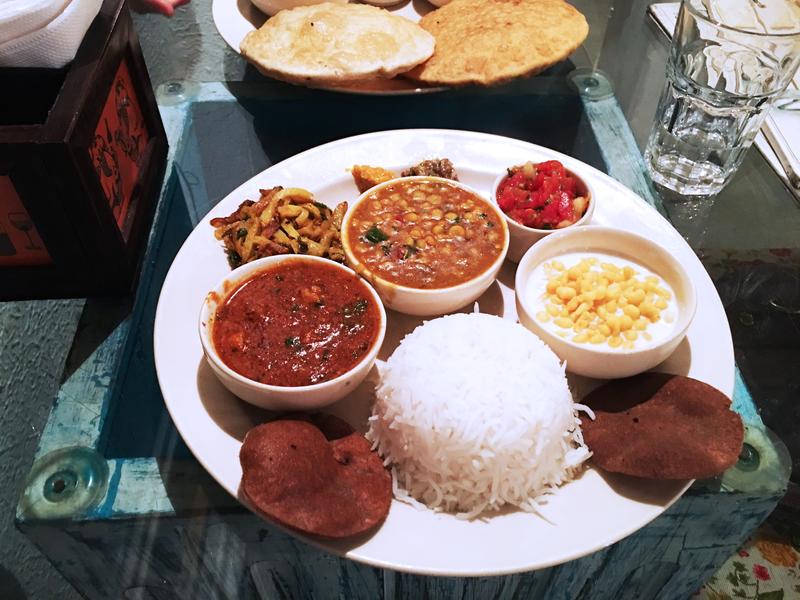 Dal Bhaat Thali: Rice, channa dal, marua (buckwheat) poories, aloo bhujiya, ramsalan (besan sabzi), pickles n boondi raita, Potbelly Rooftop Restaurant, New Delhi, Delhi, India
