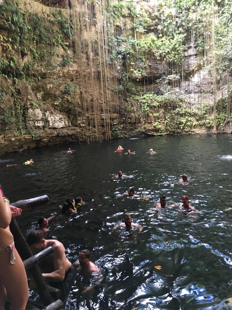 Swimming in Sacred Cenote, Chichen Itza, Yucatán, Mexico