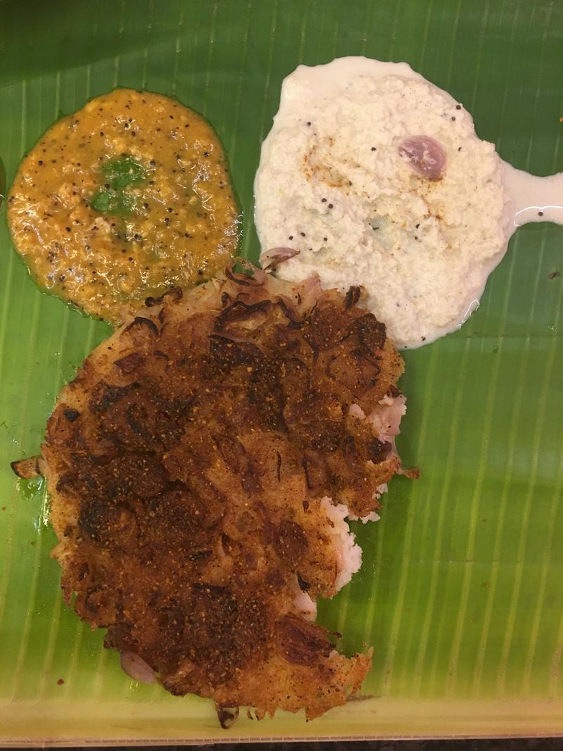 Fried onion uttapam at Murugan Idly Shop, Chennai. Tamil Nadu, India