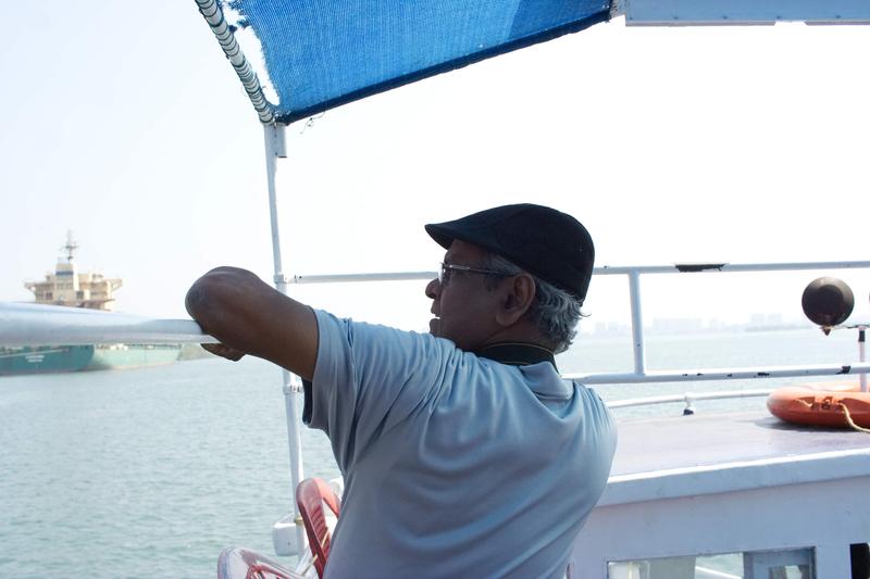 Father Xavier, on a boat tour of the backwaters, Kerala, India