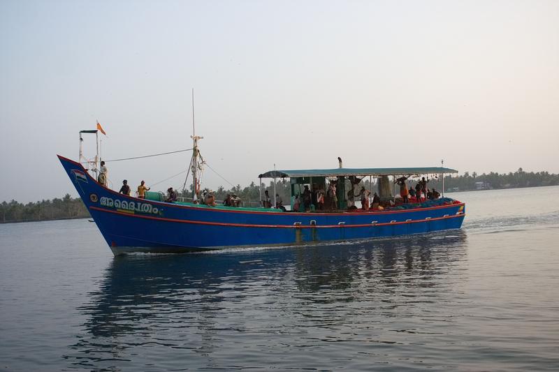 Boat coming to shore somewhere in Ernakulam, Kerala, India