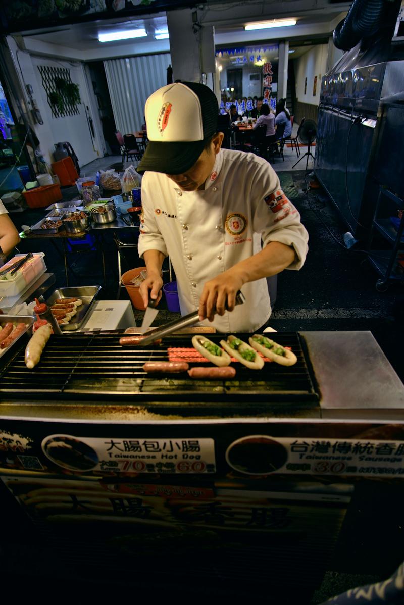 Taiwanese hot dog vendor at Liuhe Night Market, Kaosiung, Taiwan