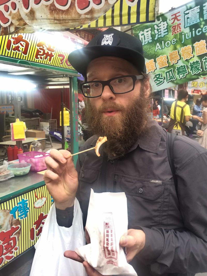 Eating squid on Cijin Island, Taiwan