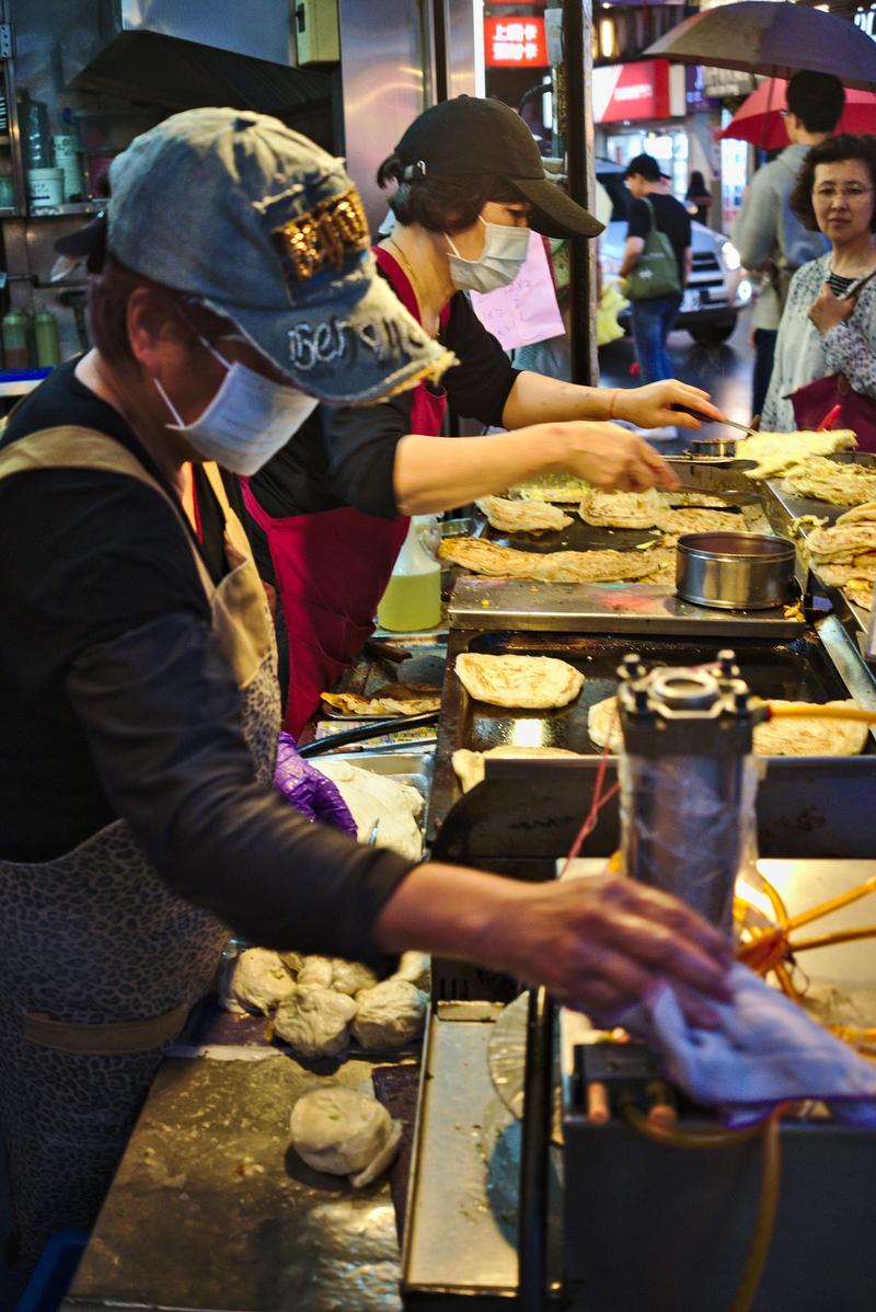 Making pancakes at Tianjing Chong Zhua Pancake (scallion pancakes) Taipei, Taiwan