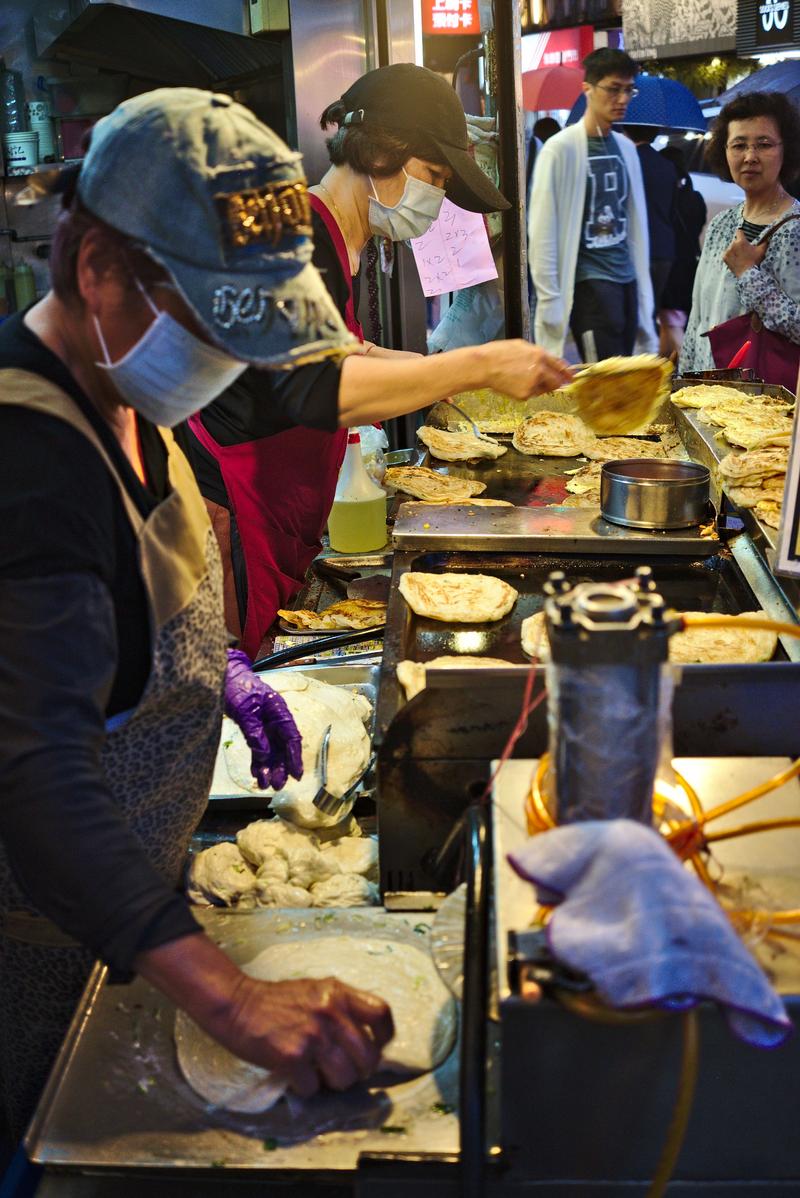 Making pancakes at Tianjing Chong Zhua Pancake (scallion pancakes) Taipei, Taiwan