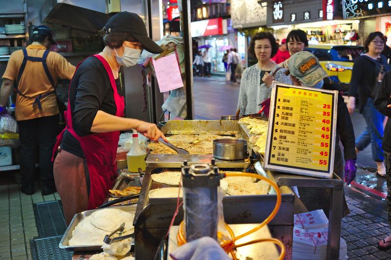 Making pancakes at Tianjing Chong Zhua Pancake (scallion pancakes) Taipei, Taiwan