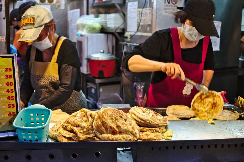 Making pancakes at Tianjing Chong Zhua Pancake (scallion pancakes) Taipei, Taiwan