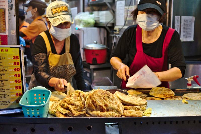 Making pancakes at Tianjing Chong Zhua Pancake (scallion pancakes) Taipei, Taiwan