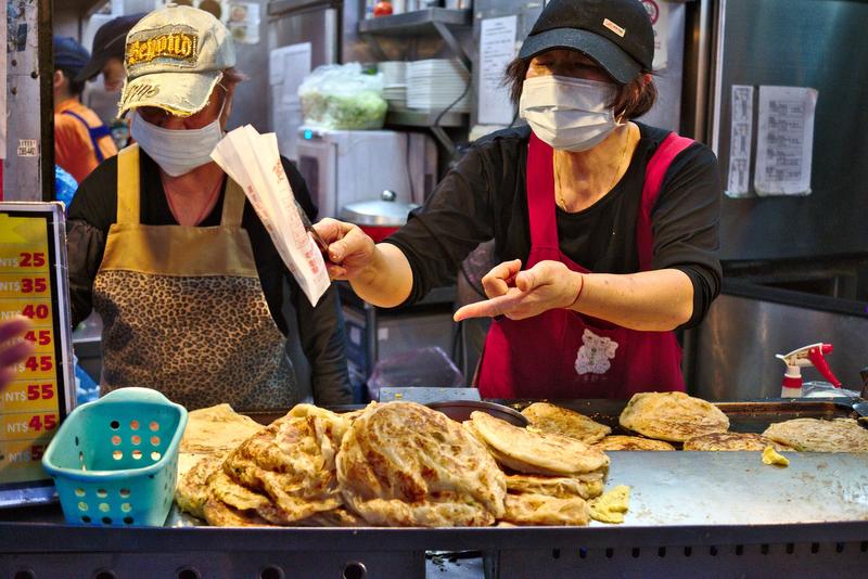 Pancakes are served at Tianjing Chong Zhua Pancake (scallion pancakes) Taipei, Taiwan