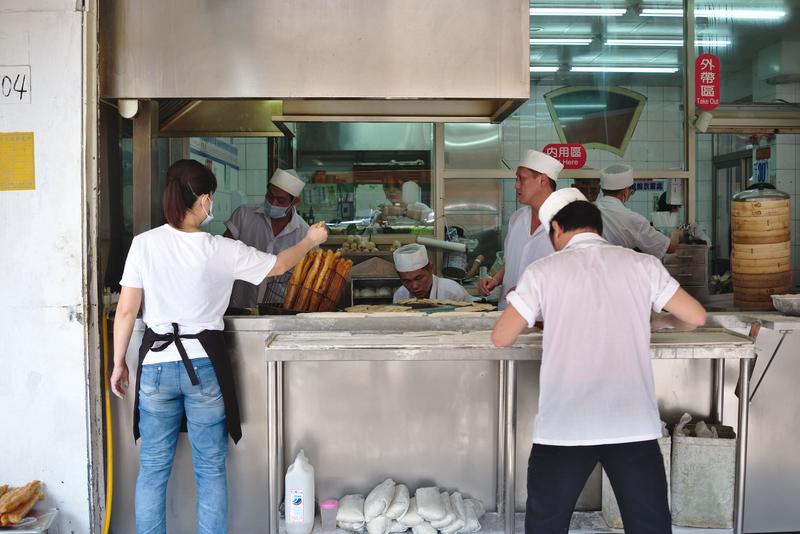 Rolling out and frying dough. Yong He Soy Milk King – Taipei, Taiwan.