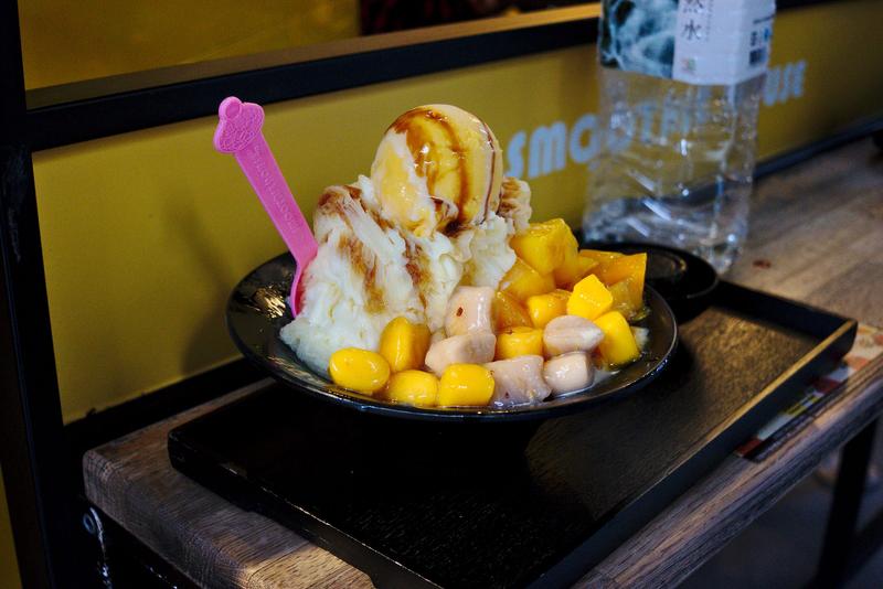 Eating a ridiculous mound of Mango Snowflake Ice with Sorbet & Taro Balls at Smoothie House, Taipei, Taiwan.