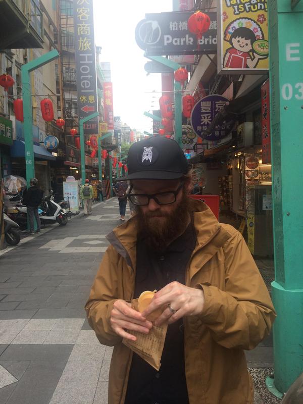 Eating a wheel cake, Taipei, Taiwan