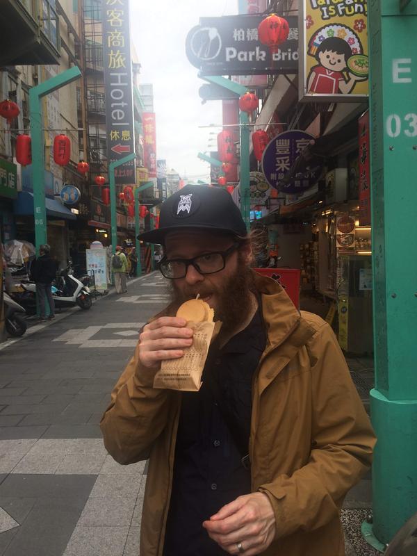 Eating a wheel cake, Taipei, Taiwan