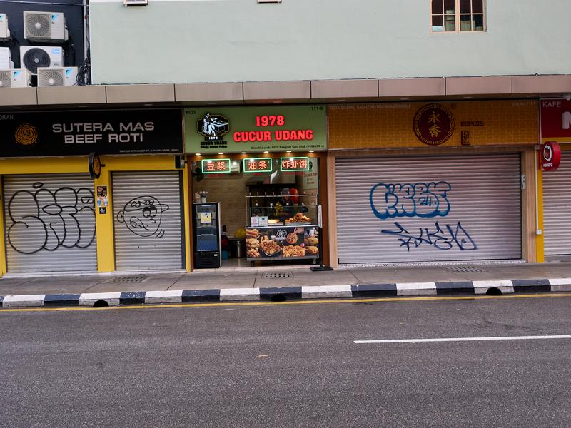 City street art and store front, Kuala Lumpur, Malaysia