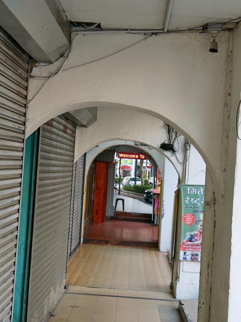 Covered street look through - welcome to..., Kuala Lumpur, Malaysia