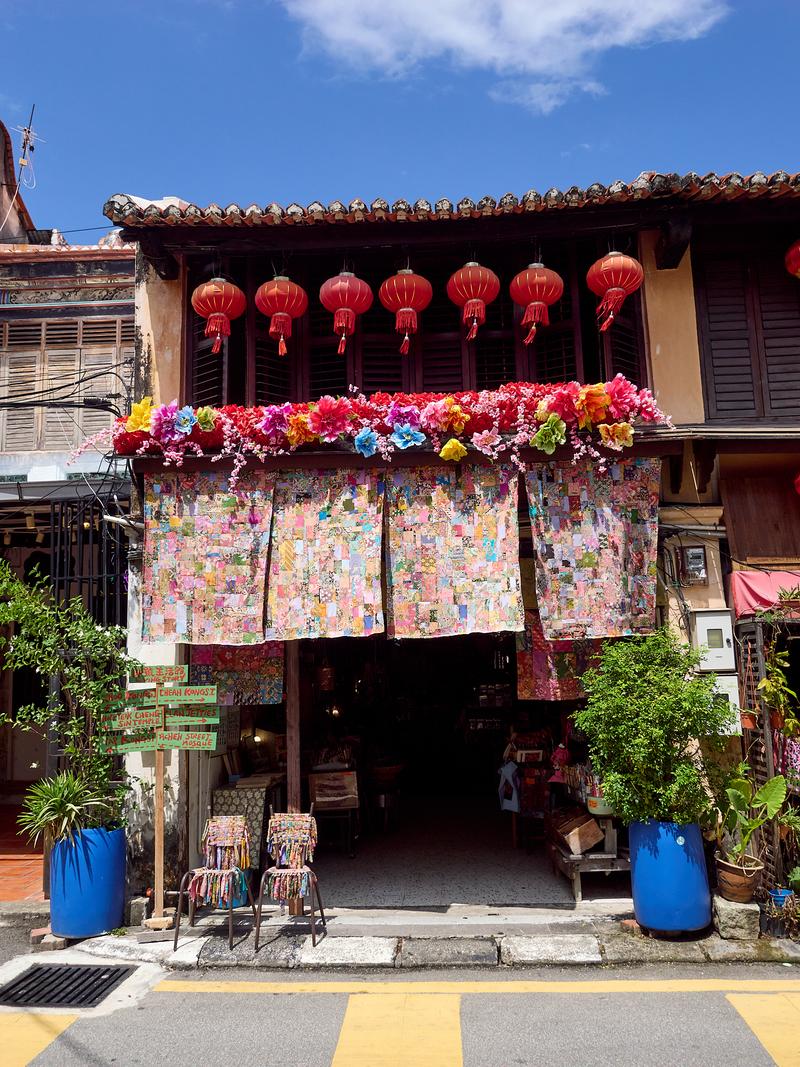 Colorful storefront with lanterns, Penang, Malaysia