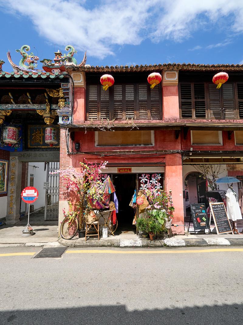 Colorful storefront with lanterns, Penang, Malaysia