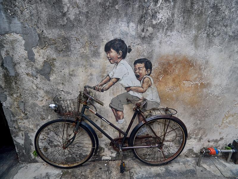 Kids on a bike street art details, Penang, Malaysia