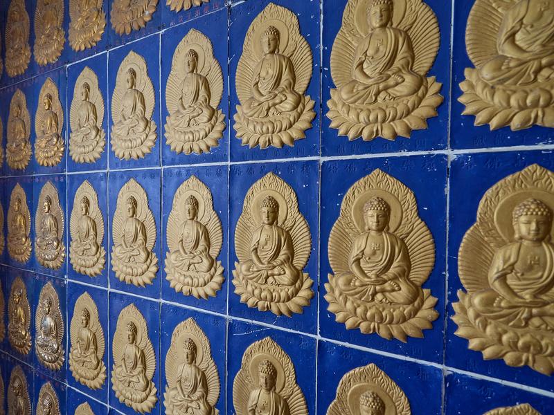 Buddahs lining the pagoda walls, Kek Lok Si Temple, Penang, Malaysia