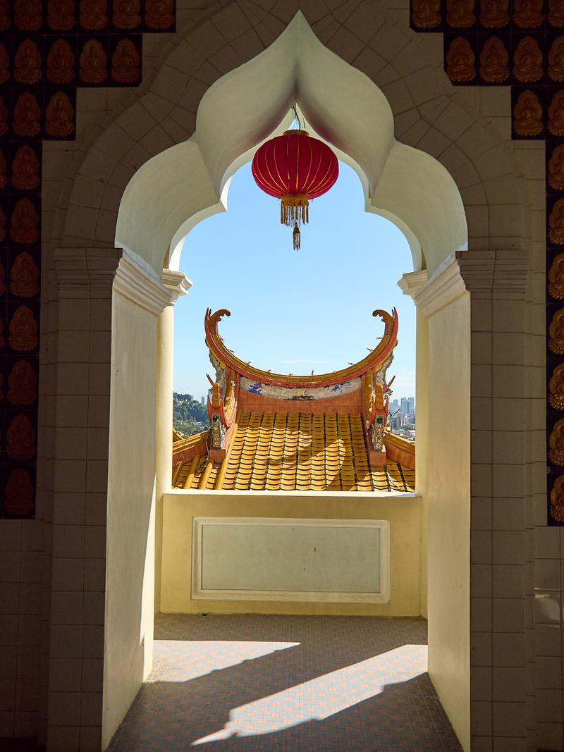 Cityscape through pagoda arch, Kek Lok Si Temple, Penang, Malaysia