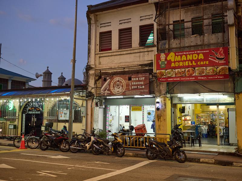 Night time mosque and restaurants, Penang, Malaysia
