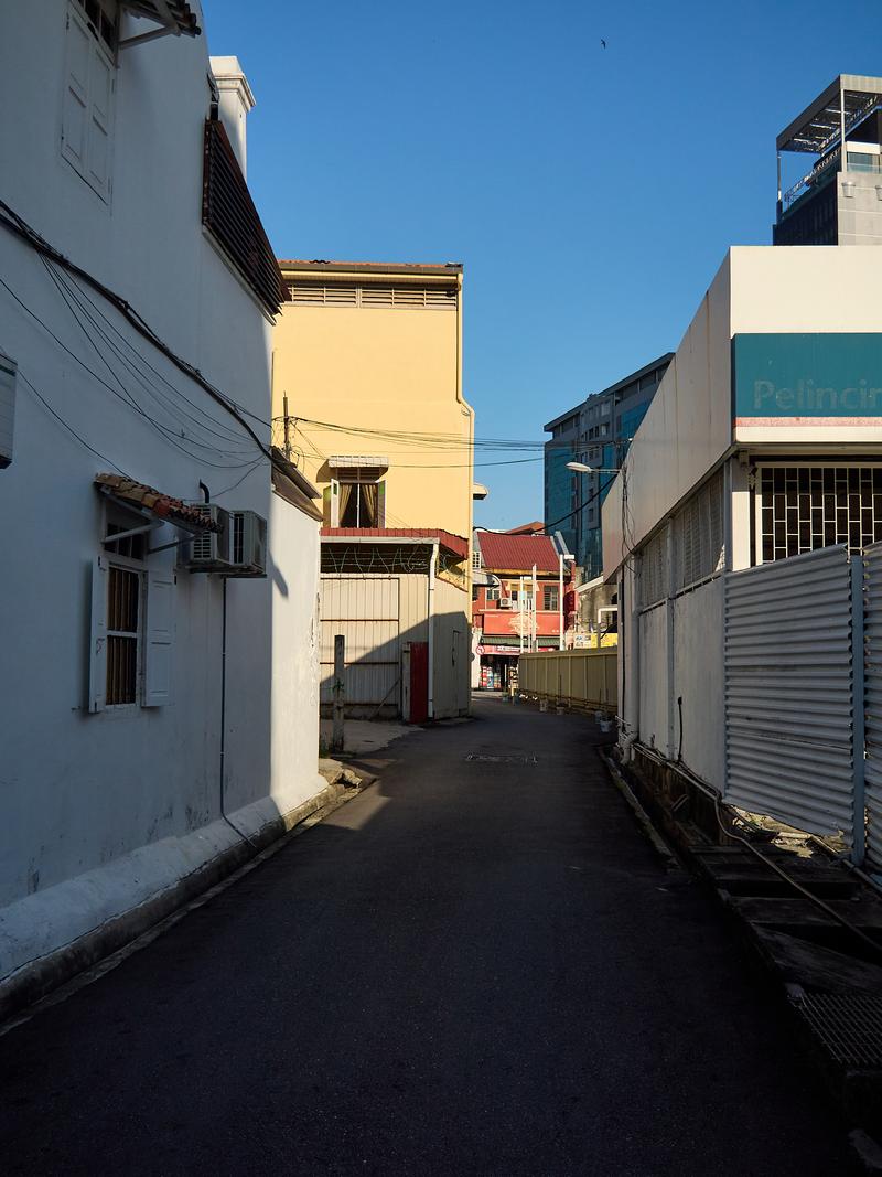 Colorful buildings, leading light, shadows, Penang, Malaysia