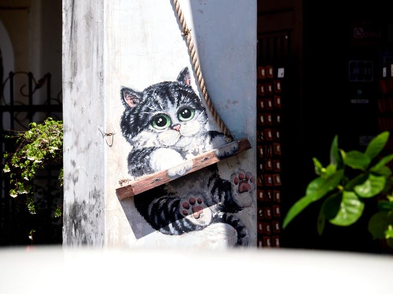 Cat on a swing street art, Penang, Malaysia