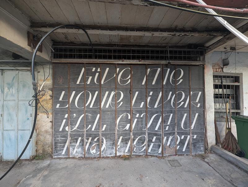 Give me your liver, I'll give you my heart street art, Penang, Malaysia
